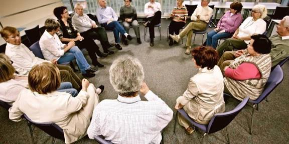 Support group meeting for families of visually impaired individuals